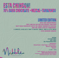 Nibble Chocolate packaging with colorful text on a textured background