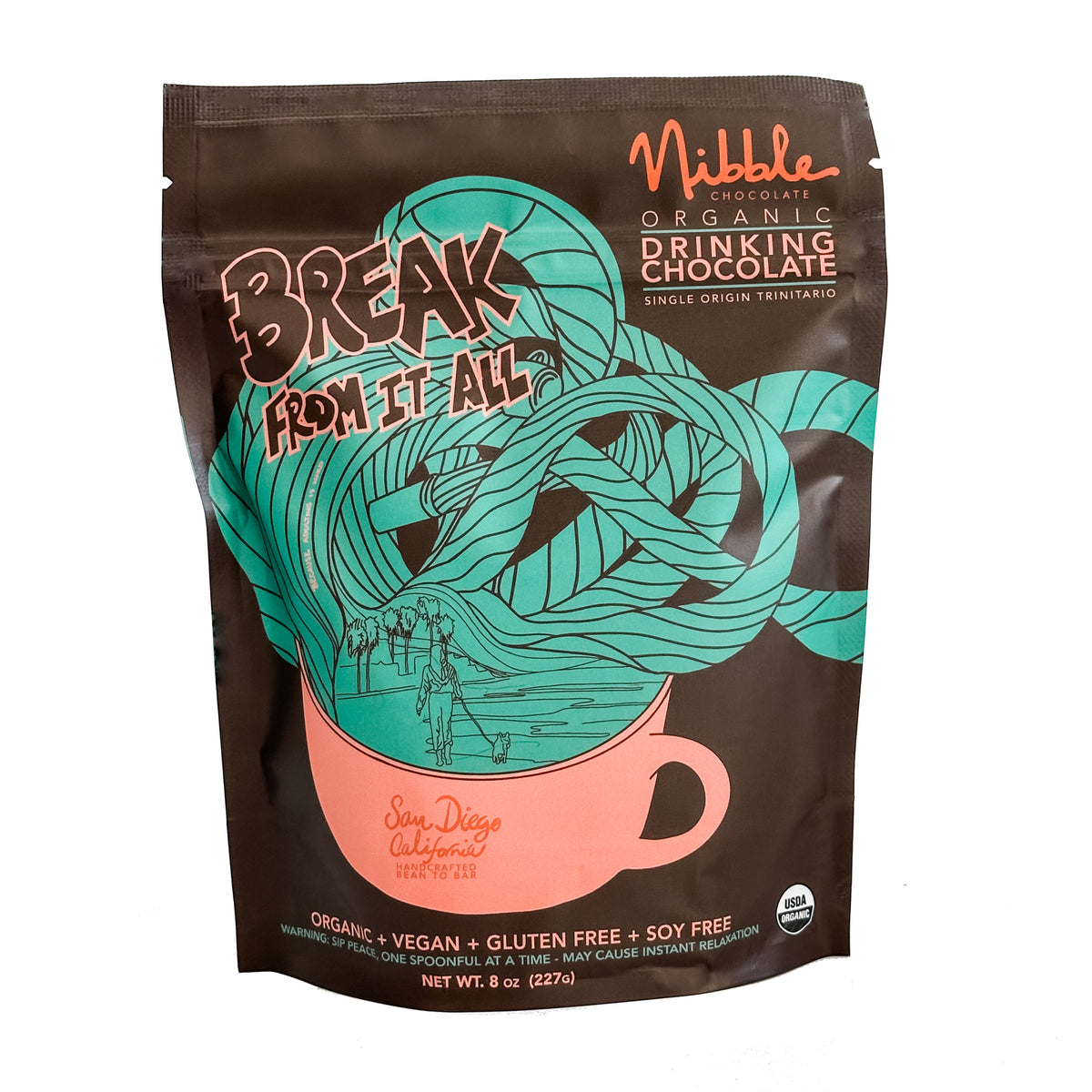 Nibble Organic Drinking Chocolate packaging featuring a whimsical design and a tagline 'Break from It All'.