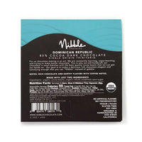 Back packaging of Nibble Extra Dark Chocolate, 85% cocoa from Dominican Republic, featuring nutrition facts and ingredients.