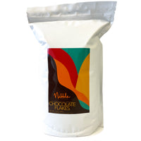 White bag of organic tempered chocolate with Nibble Chocolate label