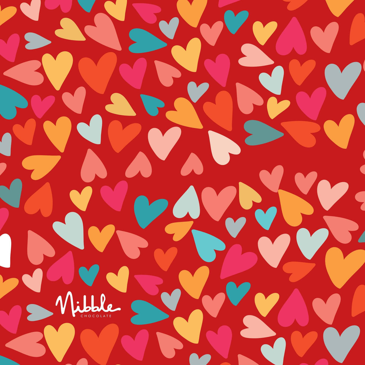 Red heart pattern gift wrap for Valentine's Day chocolate truffles