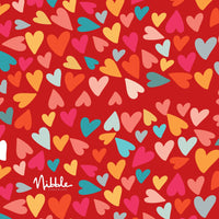 Red heart pattern gift wrap for Valentine's Day chocolate truffles